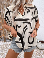 Perfee Printed Notched Half Sleeve Blouse